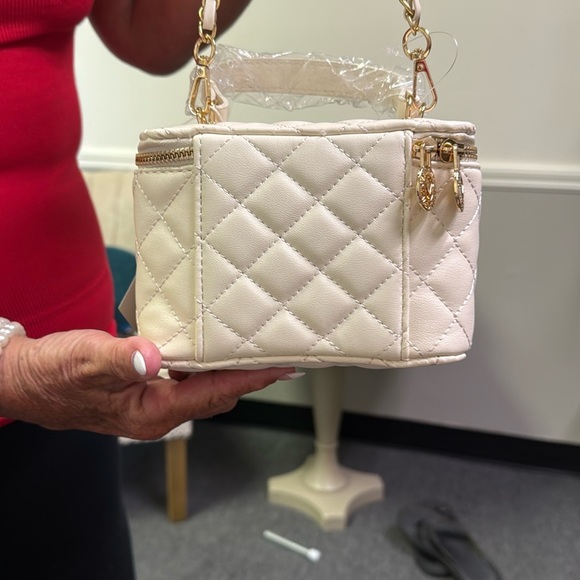 Valentino Orlandi Cream and Gold Mini Bag with Quilted Design
$99.00 TODAY ONLY - Picture 9 of 14